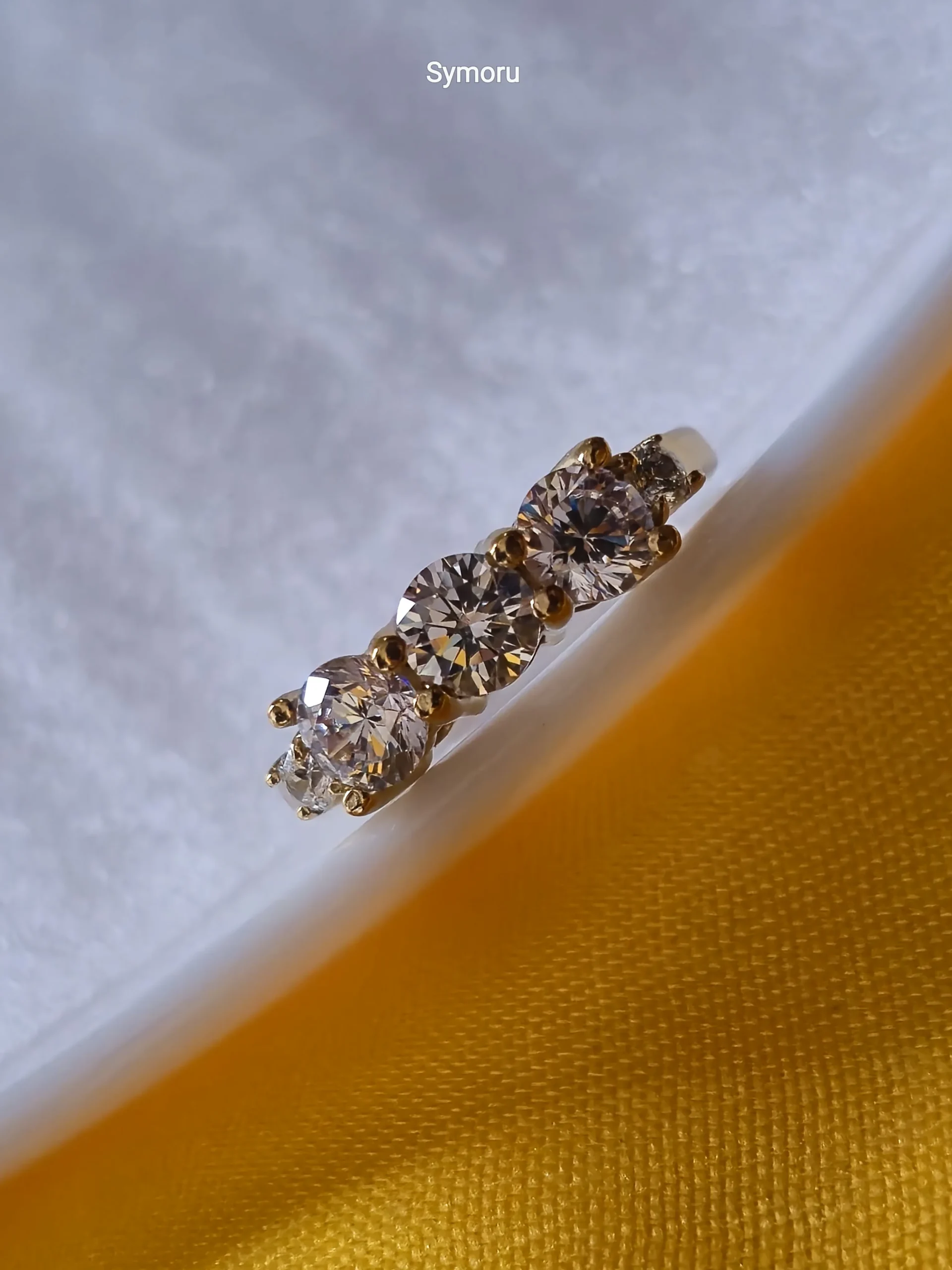 Elegant Three Stone CZ Gold Ring
