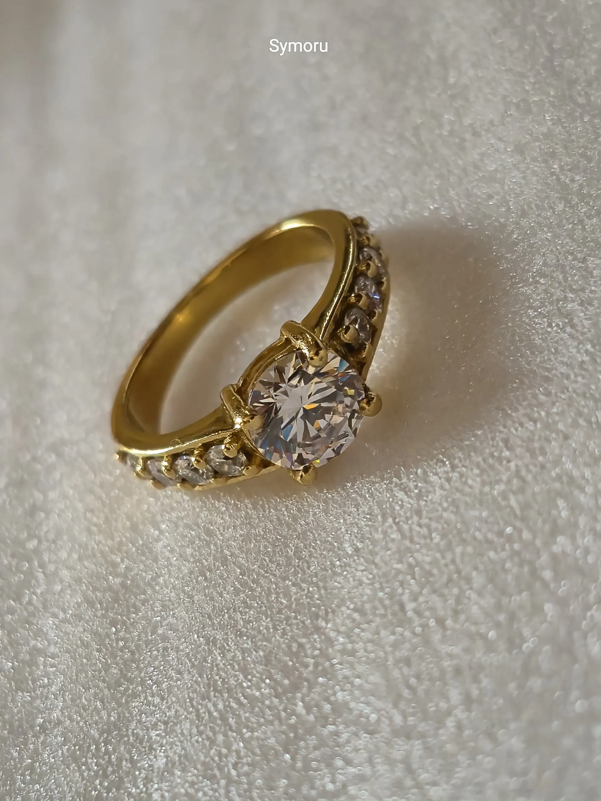 Classic Solitaire CZ Gold Ring with Side Stones